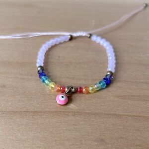Rainbow pink rainbow chakra glass bead adjustable bracelet, evil eye